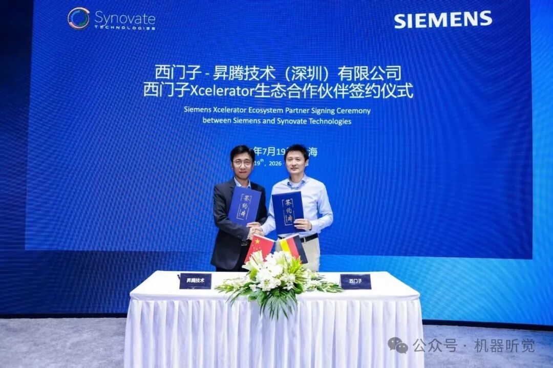 Synovate Technologies CTO, Forrest Li, captured posing at the signing of the Siemens Xcelerator